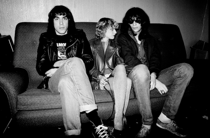The Ramones giving punk philosophy, looking cooler than the crowd outside.